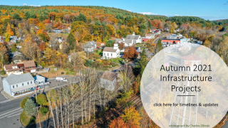 A fall landscape drone photograph of Erving Center with text "Autumn 2021 Infrastructure Projects"